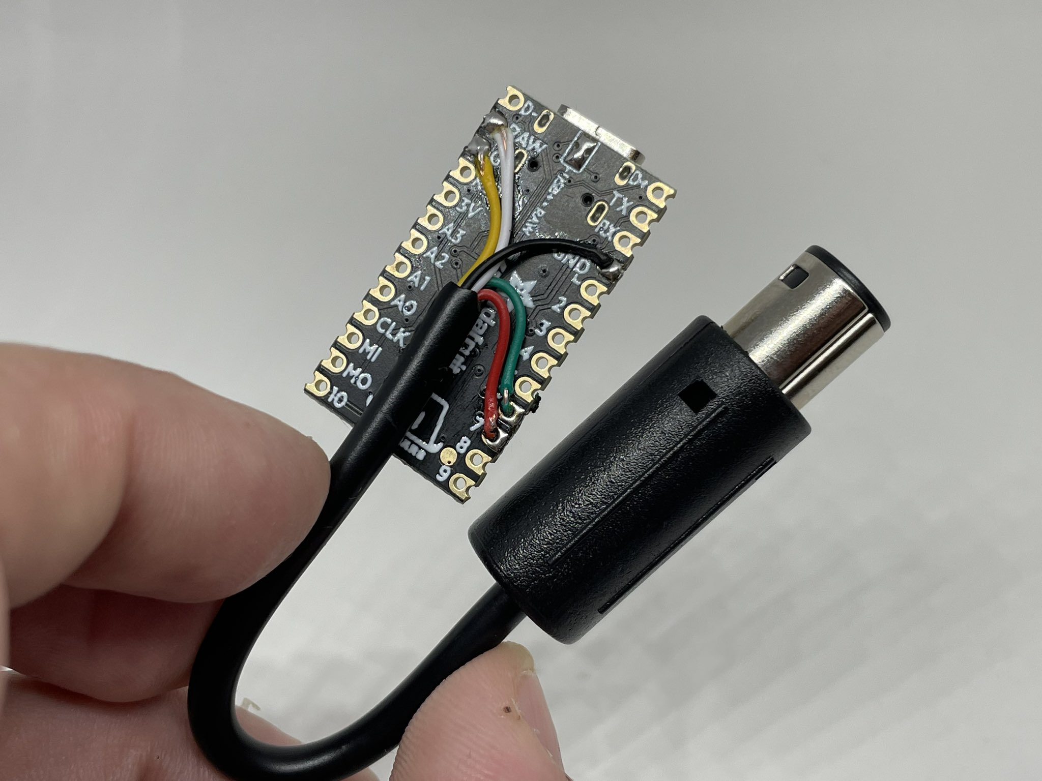 Reference KB2040 build with GameCube extension cable soldered to RAW, GPIO 6, GPIO 7, and GND pads